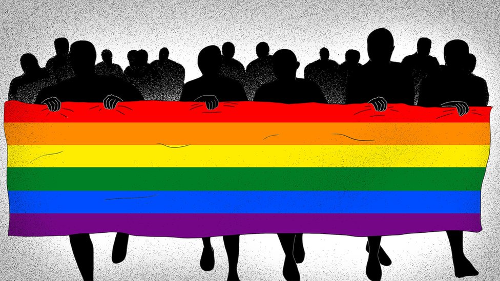 Shadows holding the LGBTQ+ Flag, with other shadows behind.